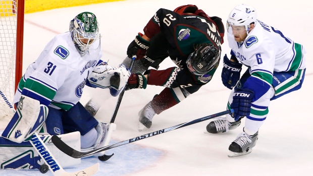 Canucks Eddie Lack Coyotes Tye McGinn Canucks Yannick Weber, CP Canucks Eddie Lack Coyotes Tye McGinn Canucks Yannick Weber
