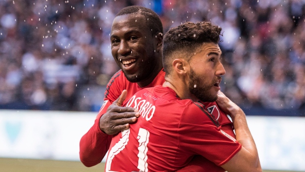 Osorio and Altidore, The Canadian Press Osorio and Altidore