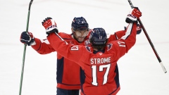 Alex Ovechkin and Dylan Strome celebrate