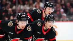 Jake Sanderson, Ridly Greig and Brady Tkachuk 