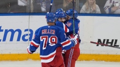 K'Andre Miller, Vincent Trochek, and Artemi Panarin