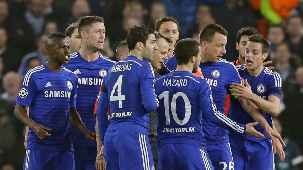 Chelsea players surround Bjorn Kuipers, The Canadian Press Chelsea players surround Bjorn Kuipers