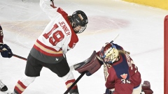 Montreal Victoire goaltender Ann-Renee Desbiens and Ottawa Charge's Brianne Jenner