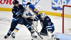 Brayden Schenn Connor Hellebuyck Neal Pionk