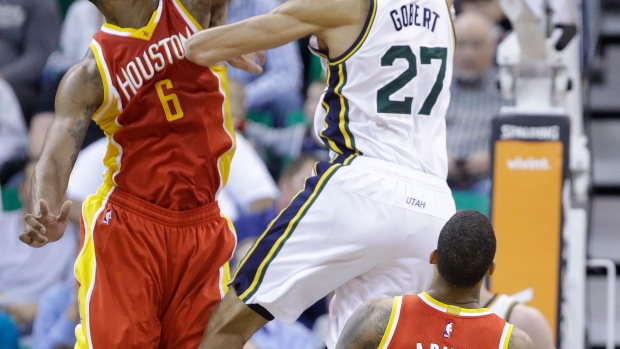 Gobert dunks, The Canadian Press Gobert dunks