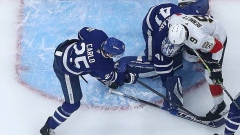 Sam Bennett makes contact with Anthony Stolarz