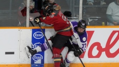 Ottawa Charge forward Danielle Serdachny and Minnesota Frost forward Britta Curl-Salemme