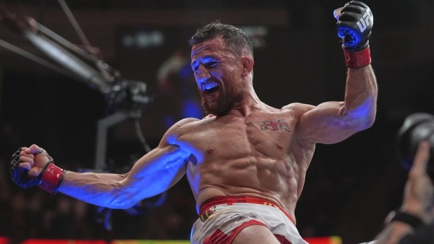 Harrison, Dvalishvili celebrate as 135-pound champions at UFC 316 with President Trump looking on Article Image 0, The Canadian Press Harrison, Dvalishvili celebrate as 135-pound champions at UFC 316 with President Trump looking on Article Image 0