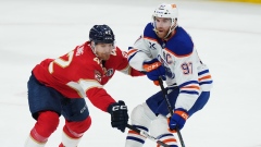 Gustav Forsling and Connor McDavid