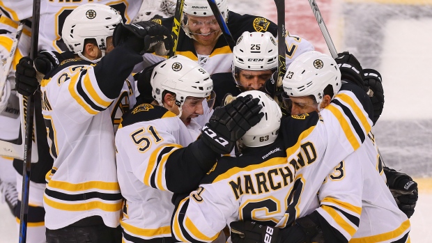 Boston Bruins celebrate, Boston Globe/Boston Globe/Getty Images Boston Bruins celebrate