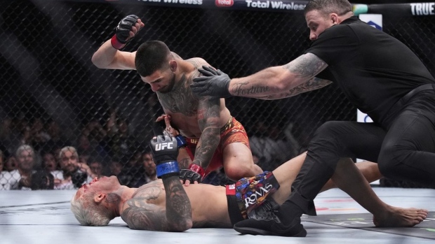 Ilia Topuria makes case for being UFC's pound-for-pound best with first-round KO of Charles Oliveira Article Image 0, The Canadian Press Ilia Topuria makes case for being UFC's pound-for-pound best with first-round KO of Charles Oliveira Article Image 0