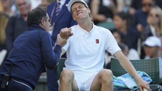 Wimbledon: No. 1 Jannik Sinner has a medical timeout for a painful elbow after a fall Article Image 0, The Canadian Press Wimbledon: No. 1 Jannik Sinner has a medical timeout for a painful elbow after a fall Article Image 0