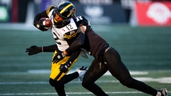 Tim White (12) and Amari Henderson