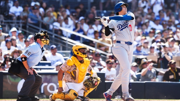 Shohei Ohtani high-fives a heckler after his homer to cap Dodgers' comeback rivalry win over Padres Article Image 0, The Canadian Press Shohei Ohtani high-fives a heckler after his homer to cap Dodgers' comeback rivalry win over Padres Article Image 0
