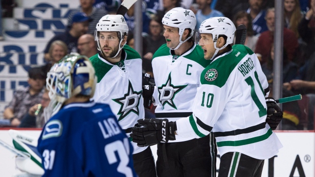 Benn, Stars celebrate, The Canadian Press Benn, Stars celebrate
