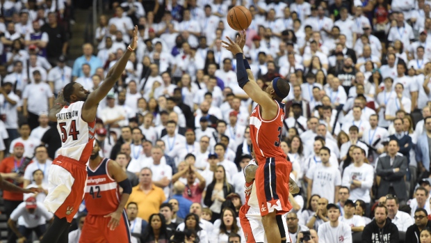 Paul Pierce shoots over Patrick Patterson