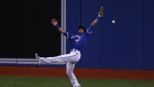 Dalton Pompey misses a Jonny Gomes fly ball