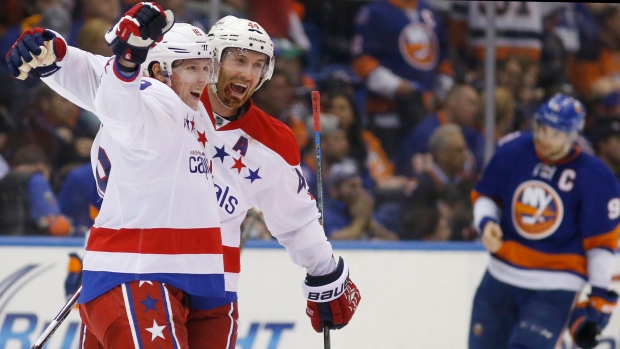 Orpik, Backstrom celebrate, The Canadian Press Orpik, Backstrom celebrate