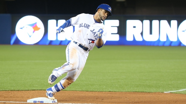 Devon Travis, Tom Szczerbowski/Getty Images Devon Travis