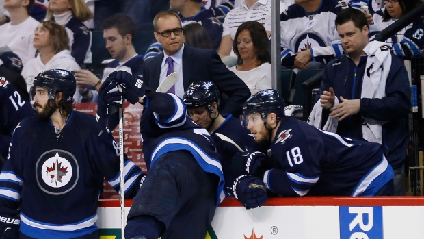 Winnipeg Jets look on, The Canadian Press Winnipeg Jets look on