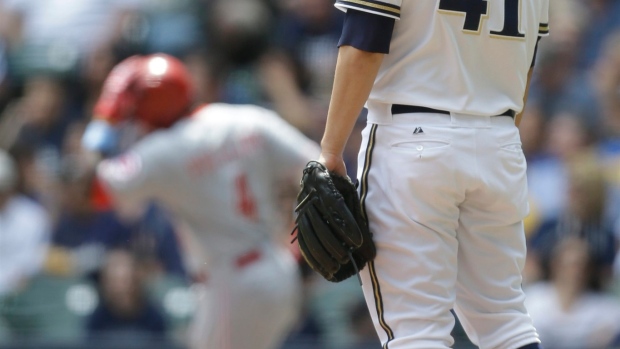 Hamilton hits leadoff homer, Phillips and Frazier also go deep as Reds power past Brewers 13-4 Article Image 0, The Canadian Press Hamilton hits leadoff homer, Phillips and Frazier also go deep as Reds power past Brewers 13-4 Article Image 0