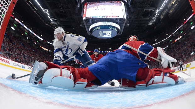 Steven Stamkos scores on Carey Price, Francois Lacasse/National Hockey League/Getty Images Steven Stamkos scores on Carey Price