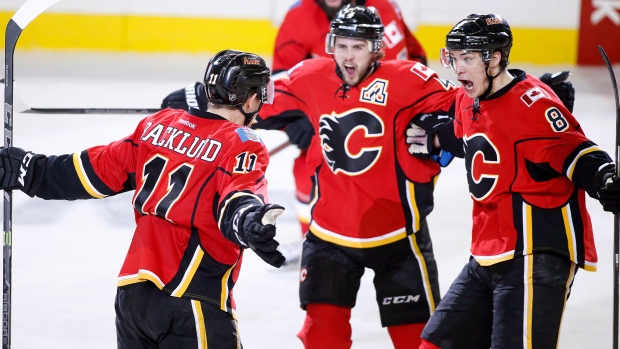 Flames celebrate, The Canadian Press Flames celebrate