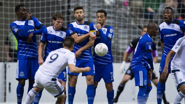 Edmonton FC players block Mezquida's kick, The Canadian Press Edmonton FC players block Mezquida's kick