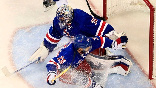 St. Louis slides into Lundqvist, The Canadian Press St. Louis slides into Lundqvist