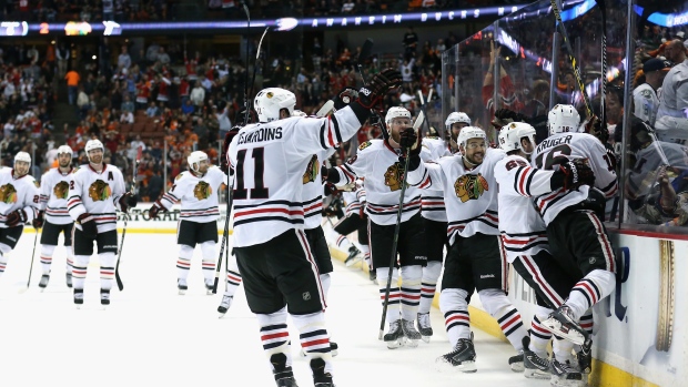 Blackhawks celebrate overtime win, Stephen Dunn/Getty Images Blackhawks celebrate overtime win