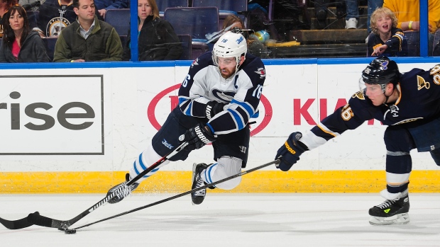 Andrew Ladd, Jeff Curry/National Hockey League/Getty Images Andrew Ladd