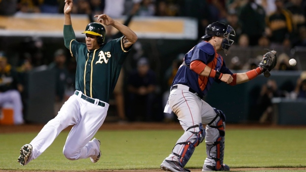 A's win fourth straight, edge Red Sox 4-3 to extend best record in majors Article Image 0