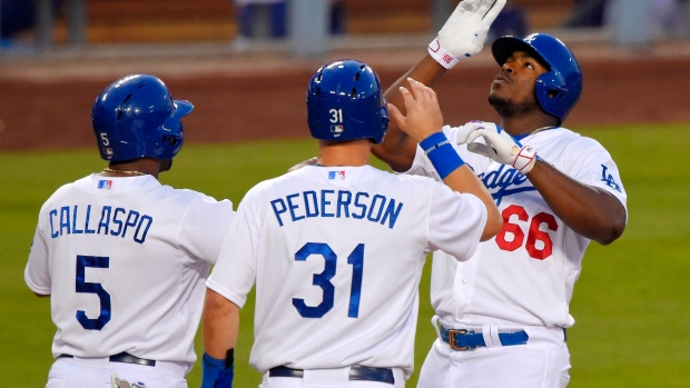 Puig celebrates scoring, The Canadian Press Puig celebrates scoring