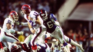 Larence Taylor pressures Jim Kelly