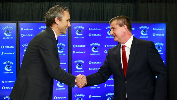 Trevor Linden and Jim Benning, Jeff Vinnick/National Hockey League/Getty Images Trevor Linden and Jim Benning