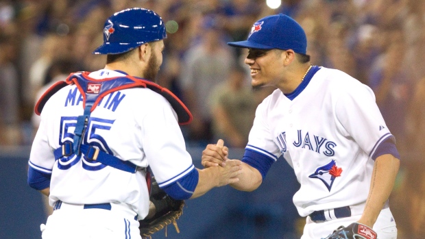 Russell Martin and Roberto Osuna, The Canadian Press Russell Martin and Roberto Osuna