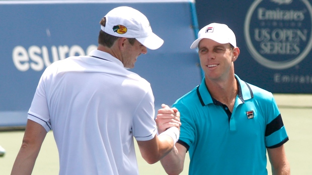 Sam Querrey and John Isner, The Canadian Press Sam Querrey and John Isner