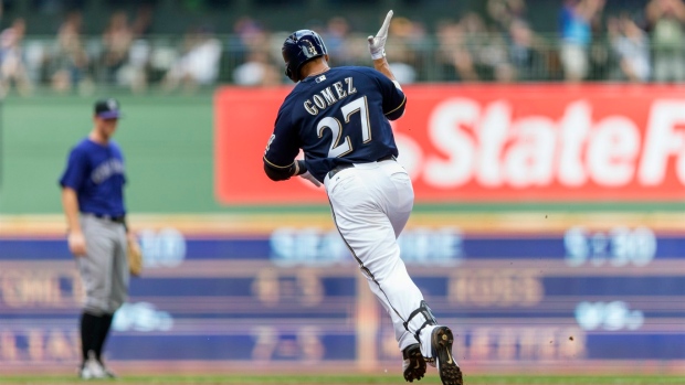 Gomez hits 3-run shot, Garza goes 7 innings and Brewers stay perfect vs Rockies with 7-4 win Article Image 0, The Canadian Press Gomez hits 3-run shot, Garza goes 7 innings and Brewers stay perfect vs Rockies with 7-4 win Article Image 0