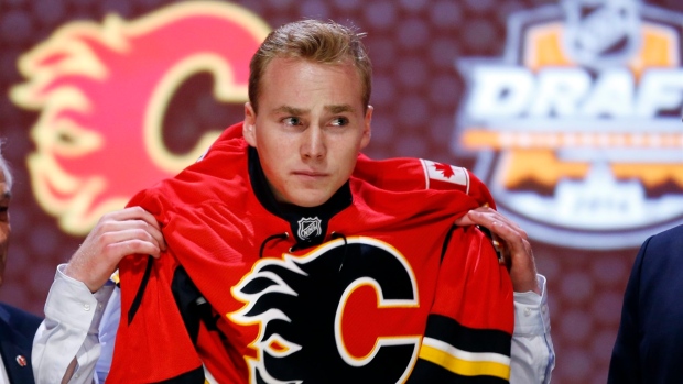 Flames toughen up on second day of draft, trade for Bollig, select Smith Article Image 0, The Canadian Press Flames toughen up on second day of draft, trade for Bollig, select Smith Article Image 0