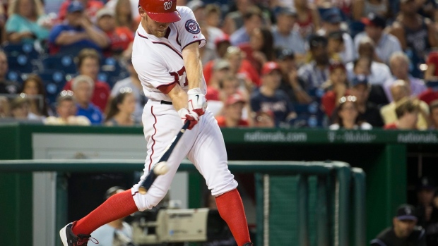 Strasburg pitches into the eighth, Werth drives in 3 and Nationals flatten Rockies 7-1 Article Image 0