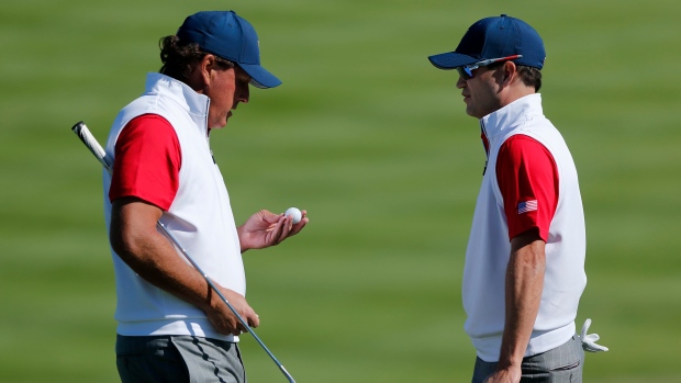 Phil Mickelson and Zach Johnson, The Canadian Press Phil Mickelson and Zach Johnson