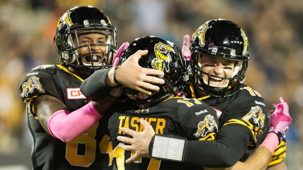 Tasker, Mathews celebrate, The Canadian Press Tasker, Mathews celebrate