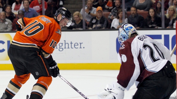 Corey Perry and Reto Berra, The Canadian Press Corey Perry and Reto Berra