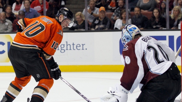 Corey Perry and Reto Berra