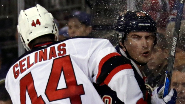 Eric Gelinas and Chris Kreider , The Canadian Press Eric Gelinas and Chris Kreider