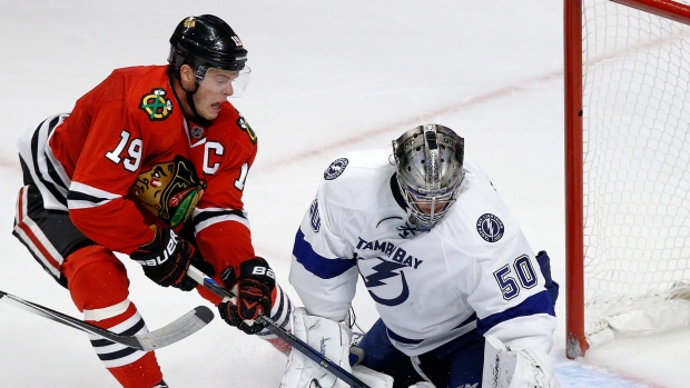 Jonathan Toews and Kristers Gudlevskis, The Canadian Press Jonathan Toews and Kristers Gudlevskis