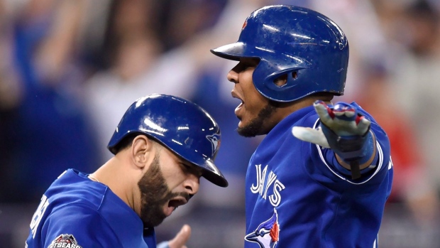 Jose Bautista & Edwin Encarnacion, The Canadian Press Jose Bautista & Edwin Encarnacion