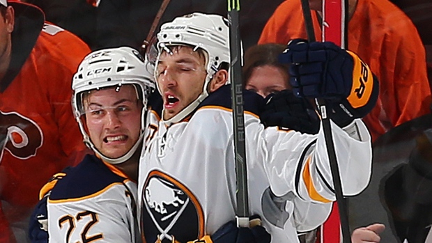 Zemgus Girgensons and Johan Larsson, Elsa/Getty Images Zemgus Girgensons and Johan Larsson