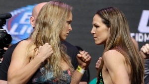 Rousey, Davis both make weight for UFC 178, no fireworks as fighters square off Article Image 0