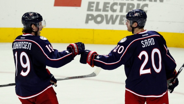 Johansen, Saad celebrate